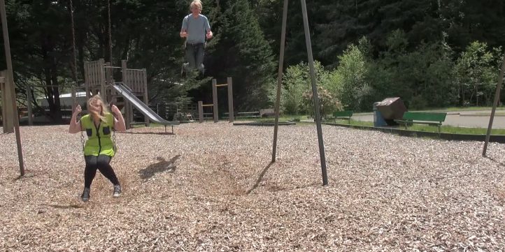 Man And Woman Swinging On a Swing