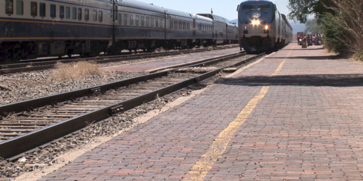 passenger train arriving at station