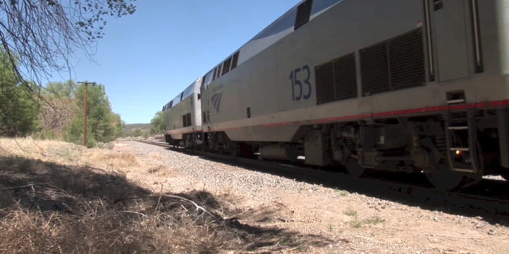 passenger train departing station