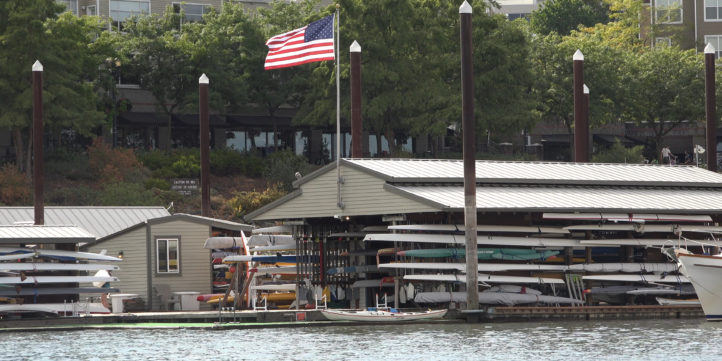 American Flag Waving At Marina