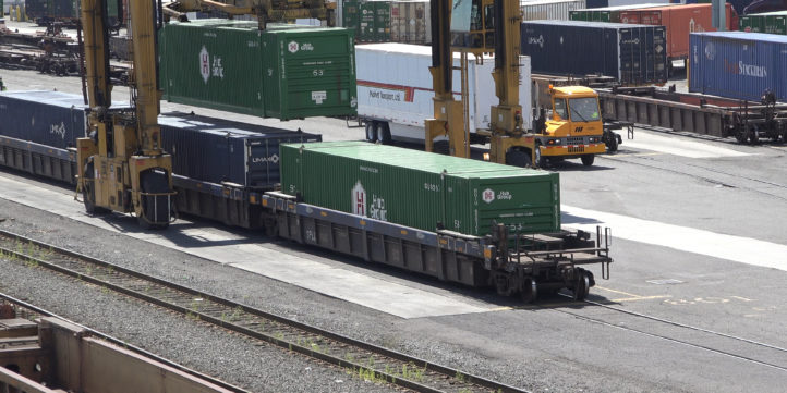 Train Car Getting Added At Freight Yard