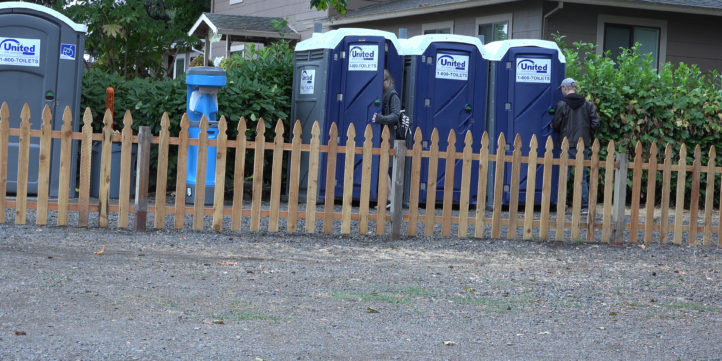 People Using Outhouses